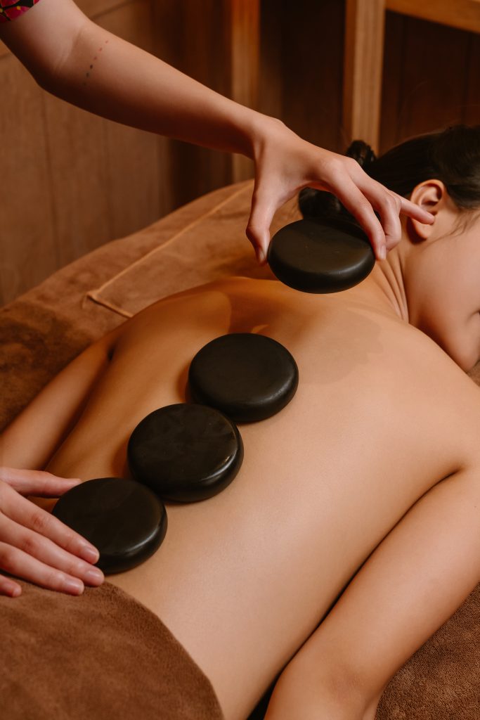 Hot stone therapy relaxing the back muscles during the 60-minute treatment at Sakurakyo Spa