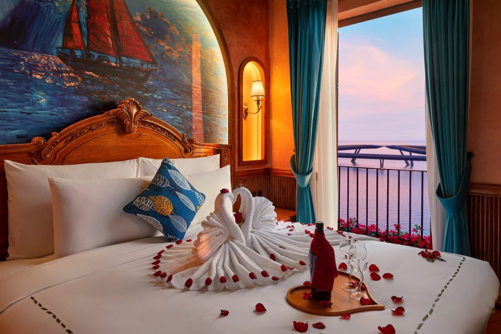 Amoris Infinitus room with a sea-view balcony at sunset, Venice Hotel, Sunset Town