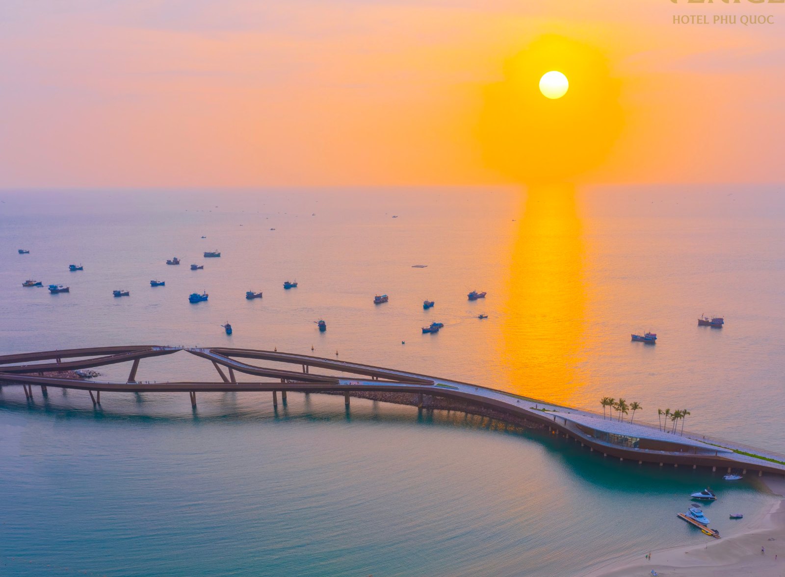The sun setting between the two arms of Kiss Bridge, Phu Quoc