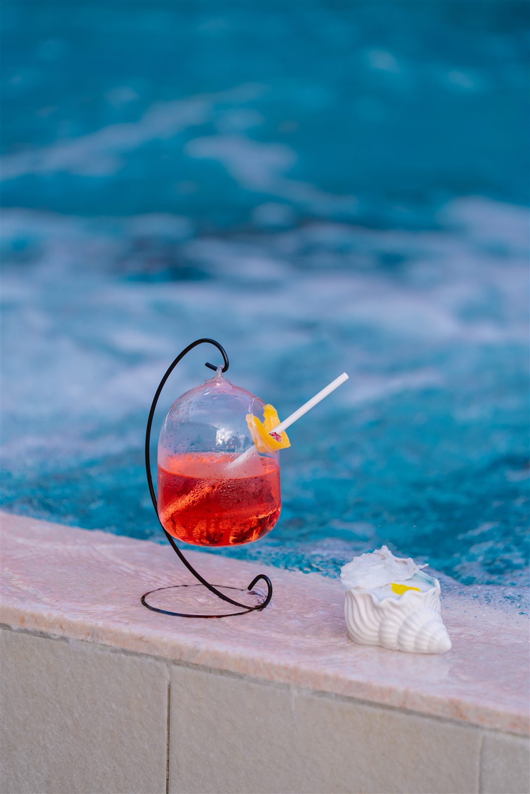 Cocktail beside the jacuzzi at Loop Jacuzzi Bar, Sunset Town at sunset