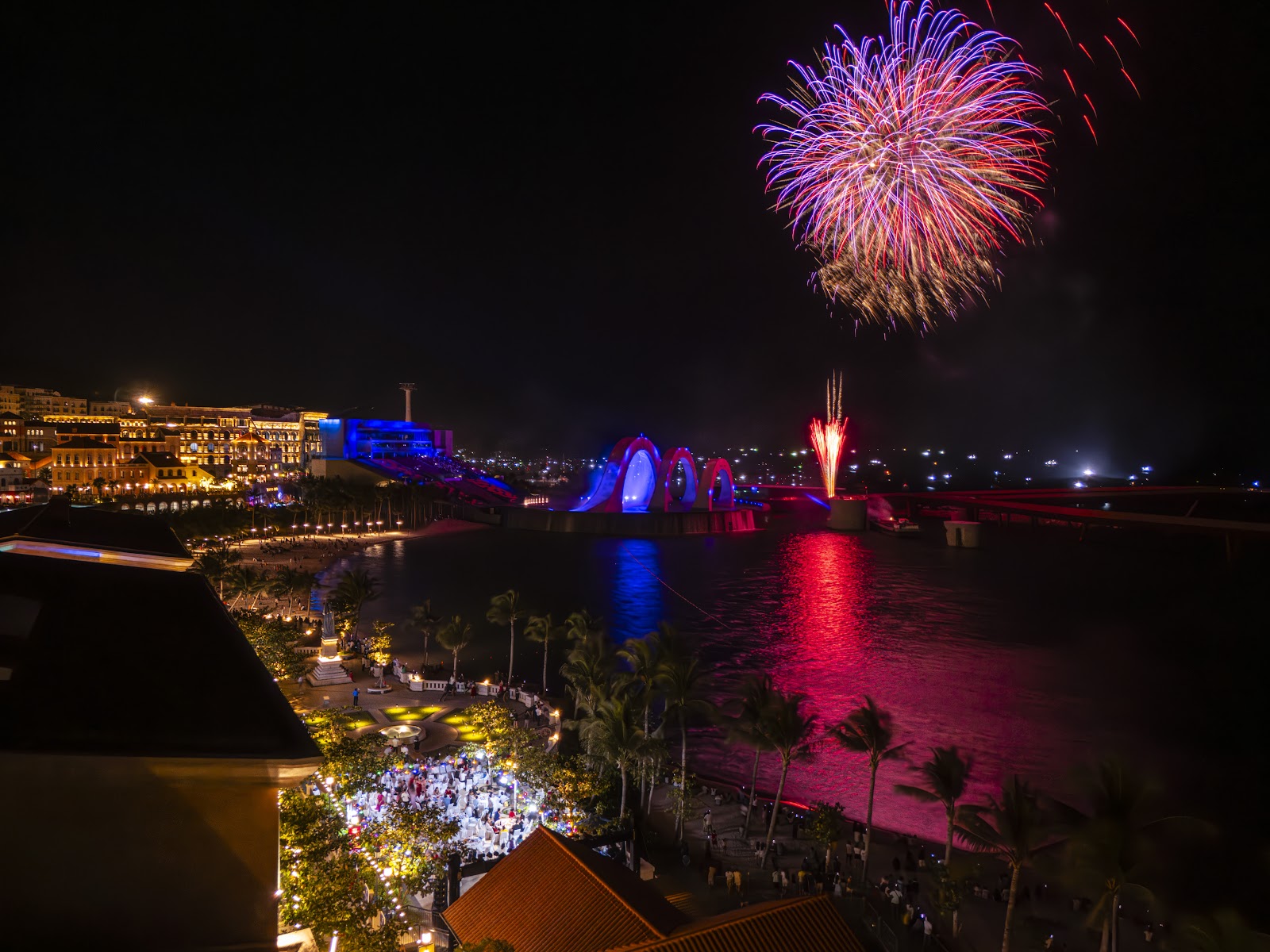 Fireworks over the sea at Sunset Town by night, Phu Quoc