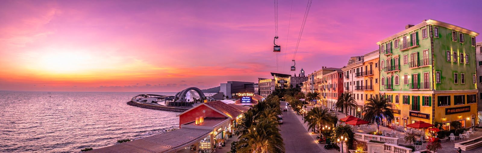 Panorama of Sunset Town and the Hon Thom cable car at sunset