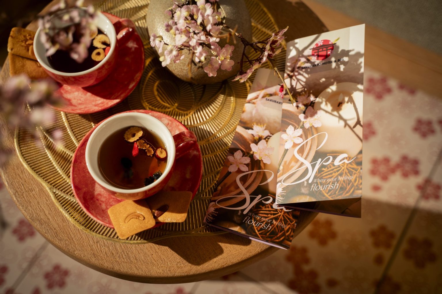 Welcome tea and cherry blossoms at Sakurakyo Spa